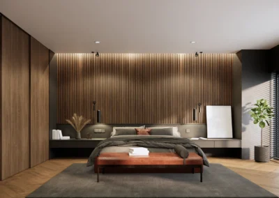 Vista frontale del letto in camera ristrutturata in bioedilizia.